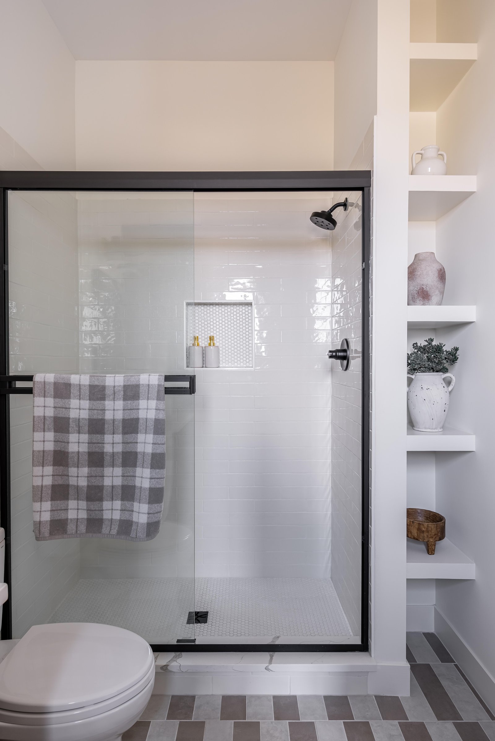 Hawthorn + Remodel bathroom wall paneling by Reschka Design Build