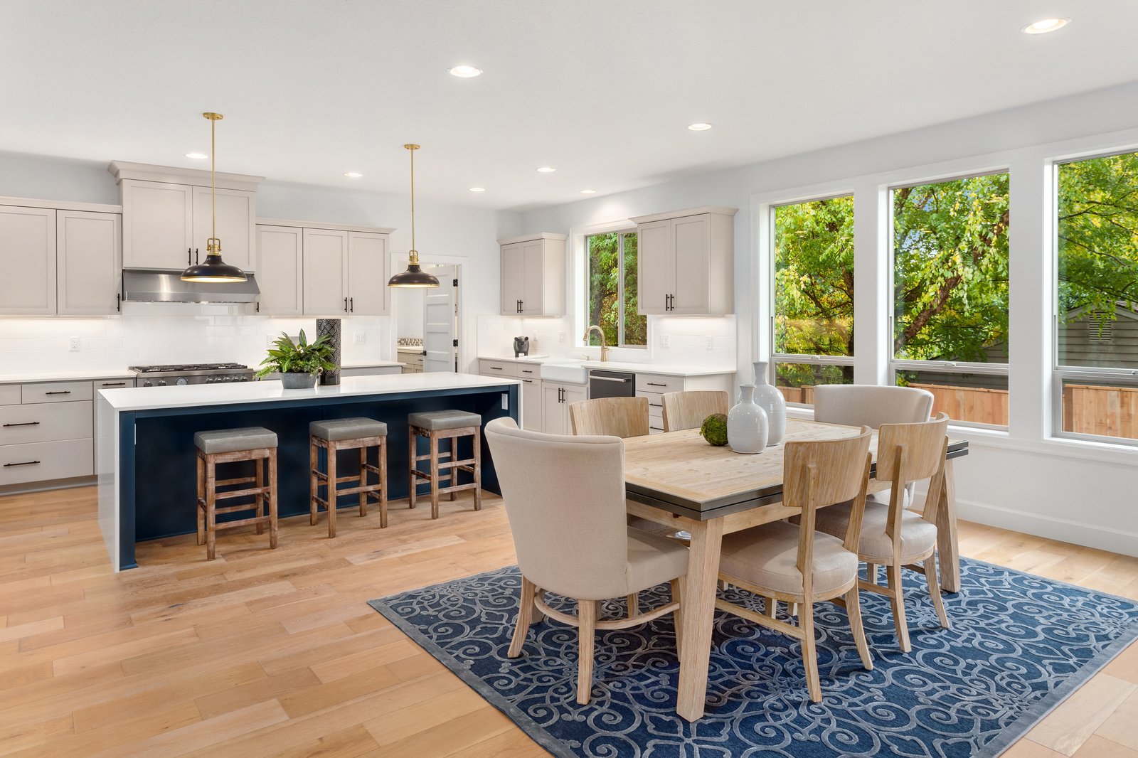 Sterling + Modern kitchen and dining space by Reschka Design Build