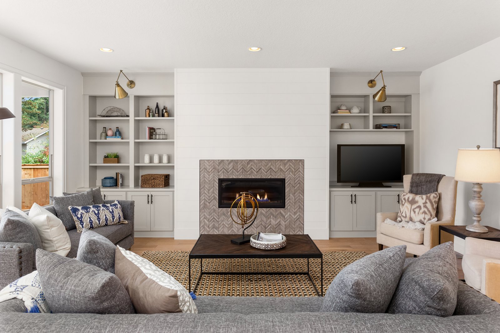 Sterling + Modern living room feature wall by Reschka Design Build